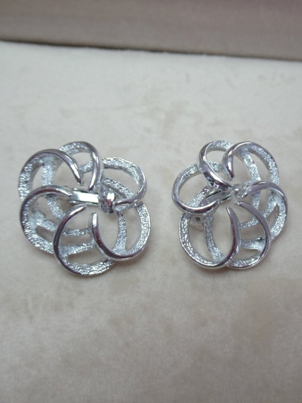 Vintage and New Sarah Coventry Swirl Clip On Earrings Silver Tone 1" diameter